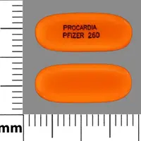 Nifedipine (eqv-adalat cc) (Nifedipine [ nye-fed-i-peen ])-PROCARDIA PFIZER 260-10 mg-Orange-Capsule-shape