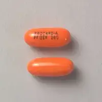Nifedipine (eqv-adalat cc) (Nifedipine [ nye-fed-i-peen ])-PROCARDIA PFIZER 260-10 mg-Orange-Capsule-shape